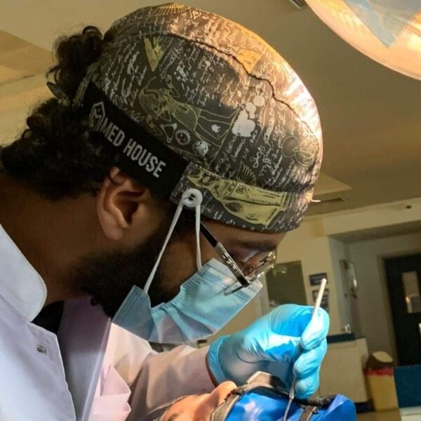 doctors wearing surgical caps